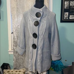 Knitted jacket with big buttons
